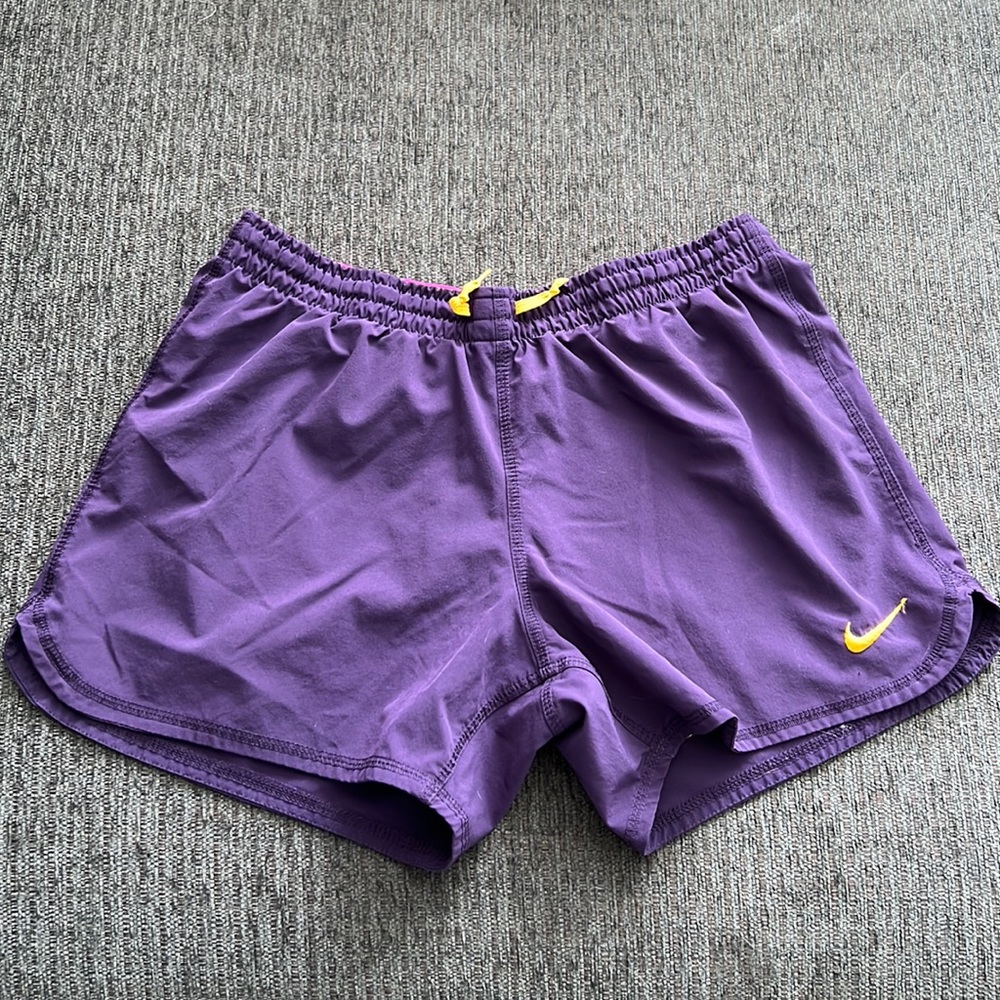 Purple and yellow Nike women’s shorts